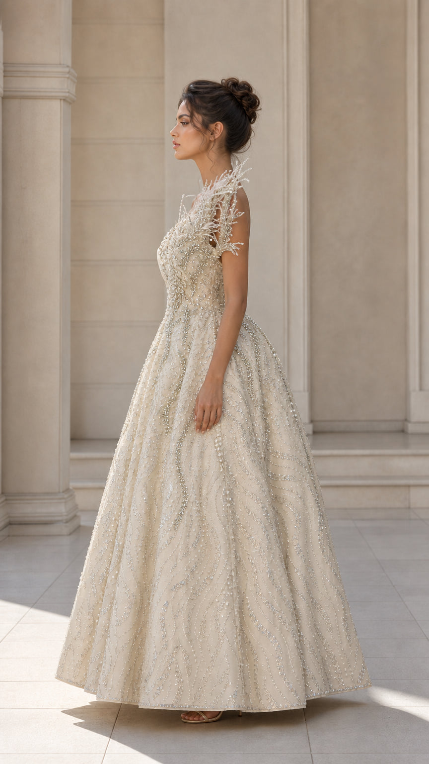 Asymmetrical Feather Accent Beaded Ball Gown