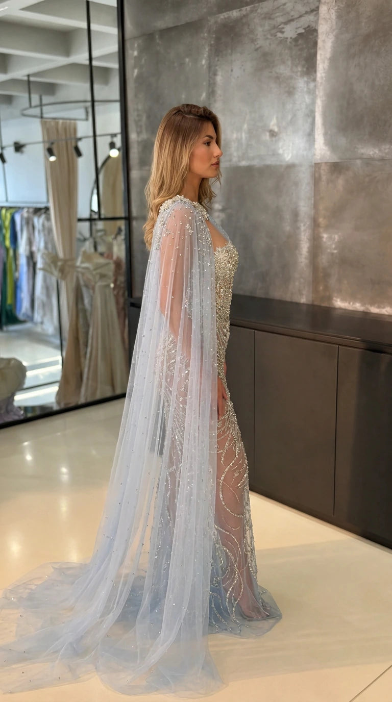 One-Shoulder Beaded Evening Gown with Dramatic Floor-Length Cape